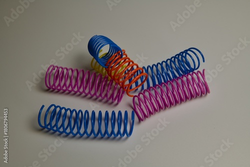 colorful plastic springs used as cat toys