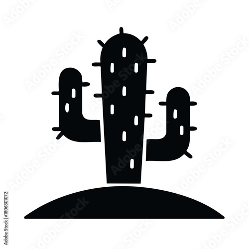 Silhouette of a Saguaro Cactus plant growing on a small mound