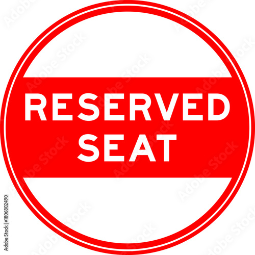Red color round seal sticker in word reserved seat on white background