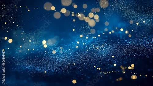 Abstract blue background with shimmering golden bokeh particles and tiny light specks, conveying festive atmosphere, modern celebration visuals suitable for backgrounds and design