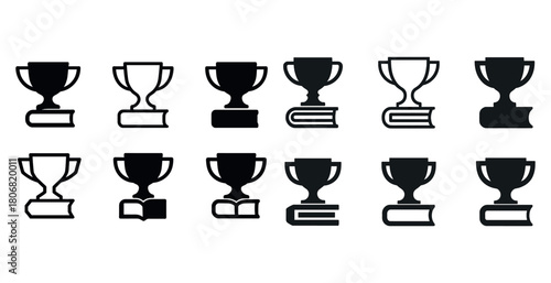 Black and white trophy and book icons: achievement and education symbols