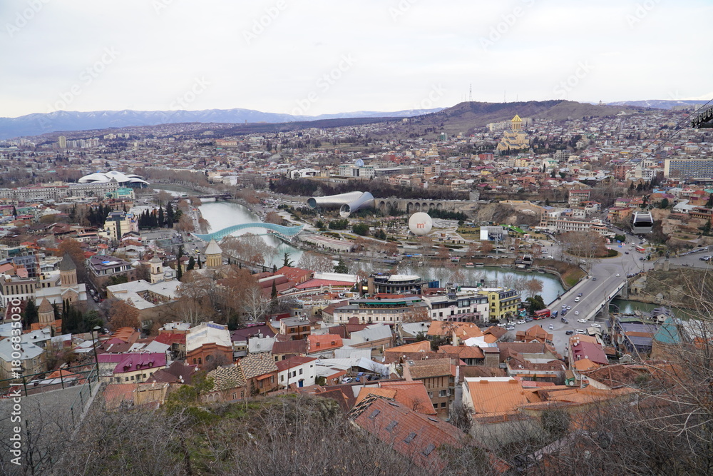 Naklejka premium View of the Old Town of Tbilisi, Georgia, with the ancient Narikala fortress towering over it.