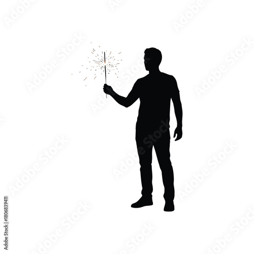 Silhouette of a man holding a sparkler with glowing embers