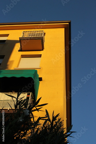 window in the yellow old house
