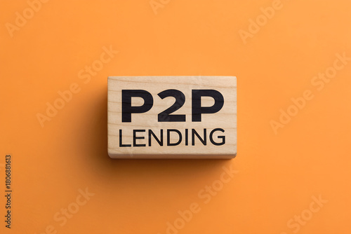 P2P Lending Concept on Wooden Block – Peer to Peer Financial Service
