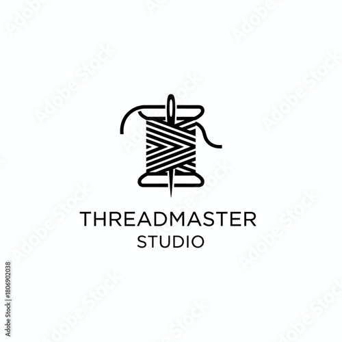 A stylized logo with a thread spool and needle, accompanied by text