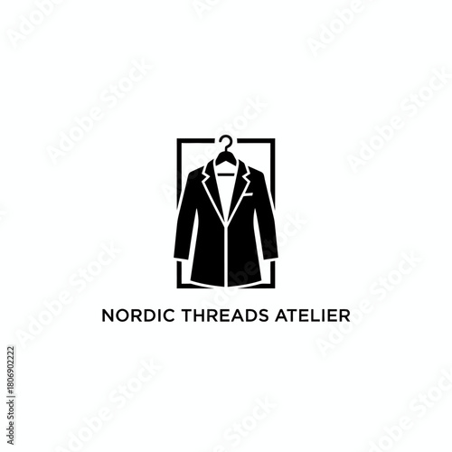 A black and white logo with a suit on a hanger inside a frame, with text below