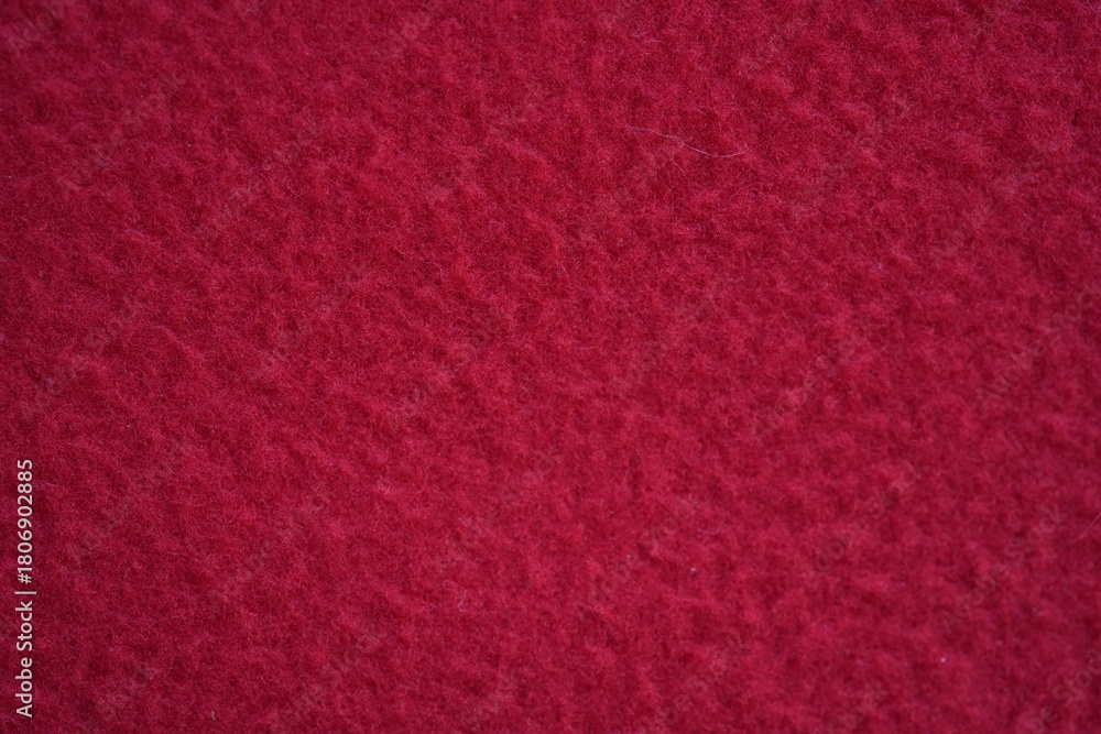 Fototapeta premium red fleece fabric texture, macro texture fleece orange fabric photo above as background 
