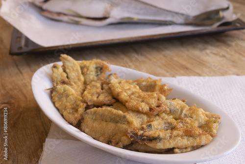 fried anchovy fritters on white plate traditional italian appetizer