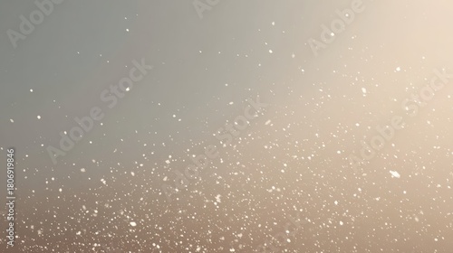 Soft Snowfall Against a Softly Lit Background