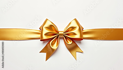 Golden ribbon bow on white background, elegant festive decoration