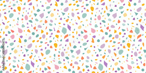 Pastel terrazzo seamless pattern with colorful irregular shapes on white background