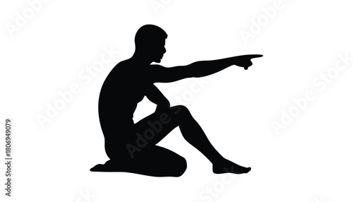 Silhouette of man sitting and pointing his finger