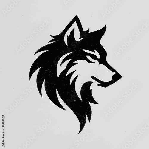 Stylized black wolf head profile on a textured gray background