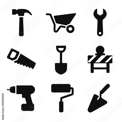 Collection of black construction tools icons including hammer and wheelbarrow