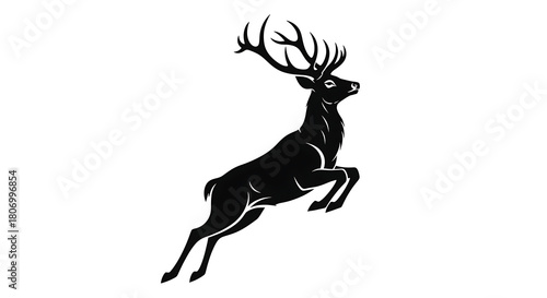 Silhouette of a majestic stag deer leaping powerfully with large antlers isolated on white background