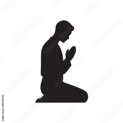 The silhouette of a person praying in a calm and peaceful atmosphere