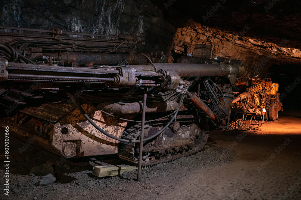Fototapeta premium Old drilling jumbo in underground mine