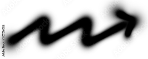 a blurred black zig-zag arrow pointing to the right on a white background