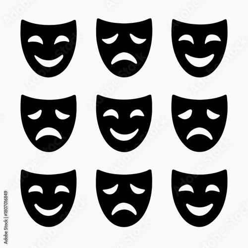 Black and white theater masks showing happy and sad expressions
