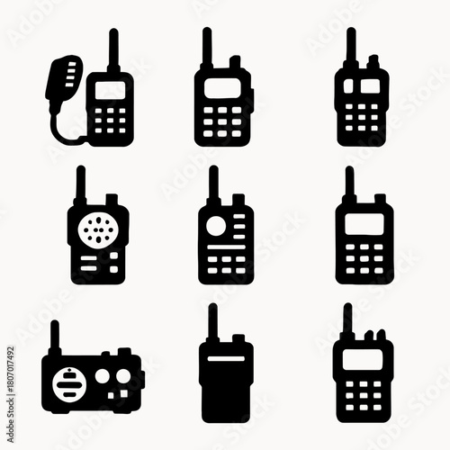 Collection of nine black silhouette walkie talkie icons with antennas
