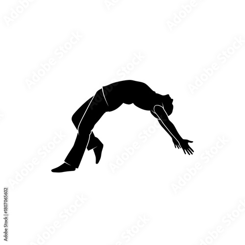 Silhouette of a person bending backward in a dynamic pose.