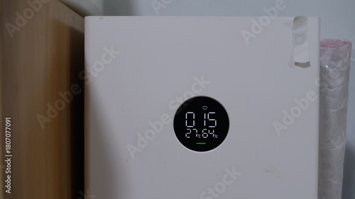 Air purify filter quality in room with green tree wood venetian blind