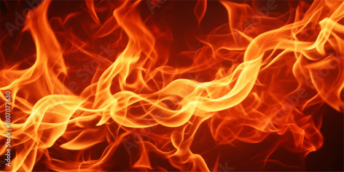 Abstract burning texture of hot fiery red and orange flames in the dark