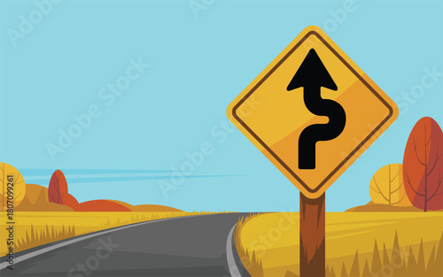 Winding Road Ahead Sign Showing a Curved Path with Autumn Trees in the Background