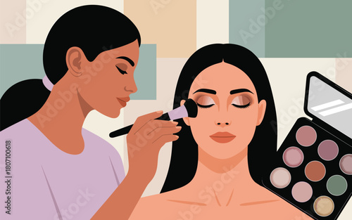 Makeup artist applying eyeshadow to a woman's face with a brush