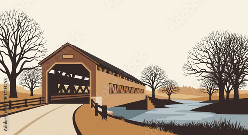 Quaint covered wooden bridge spans a gentle river in a peaceful rural landscape with bare autumn trees under a clear sky.