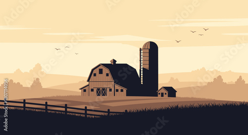 A silhouette of a classic American farm with a barn and silo against a golden sunset sky in a rural landscape.