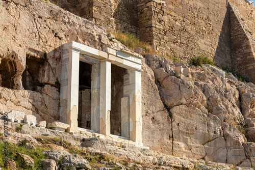 Athens, Greece. The Choregic Monument of Thrasyllos, an ancient Greek victory monument dedicated to theatrical performance, stands on the slopes below the Acropolis, near Panagia Speliotissa