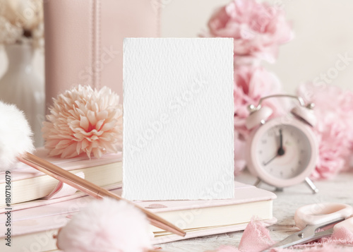 Vertical blank card near romantic pink decor, hearts and flowers closeup, Valentines spring mockup