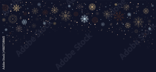 Winter banner with snowflakes, sparkling pollen and falling snow on dark blue background. Luxurious festive background perfect for Christmas, New Year, and seasonal projects
