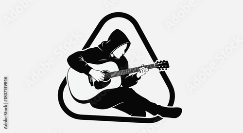 Silhouette of a person playing an acoustic guitar 1.