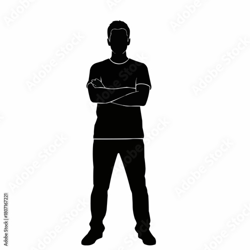 Silhouette of a man standing with arms crossed.