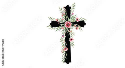 A decorative black cross adorned with pink flowers and green foliage