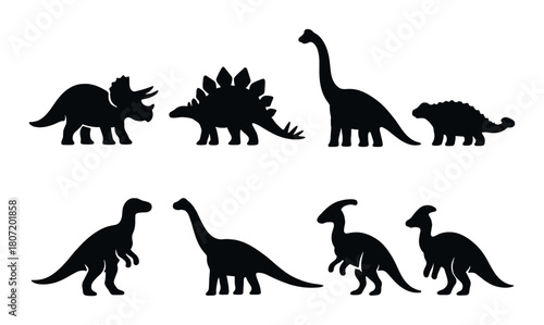 Silhouette collection of prehistoric dinosaurs on dark background