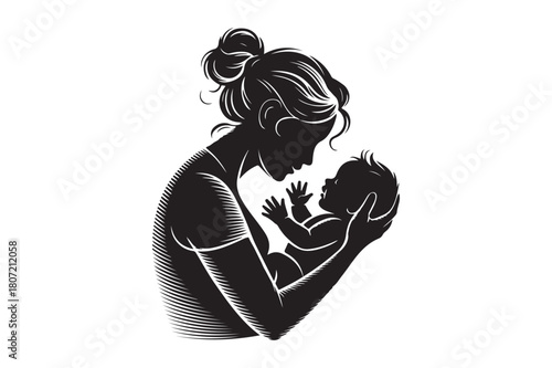 Silhouette of a mother tenderly holding her baby