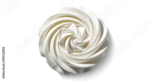 Appetizing dollop of whipped topping with soft shadows, viewed directly from above on a clean white backdrop.