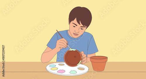 A person with brown hair paints a terracotta pot. A palette of paints sits nearby, with another pot beside them