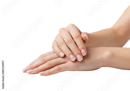Feminine hands with French tip manicure resting on a plush white spa towel near pink orchids, against a clean minimalist spa background, concept of elegant spa relaxation