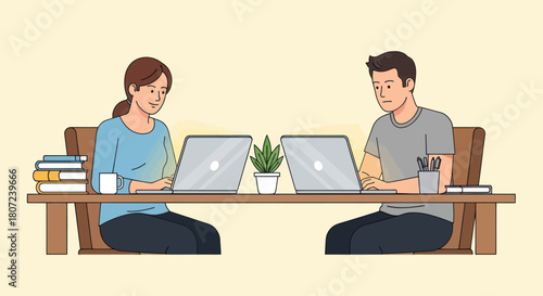 Two figures, a man and woman, sit at a shared desk working on laptops. A plant sits between them