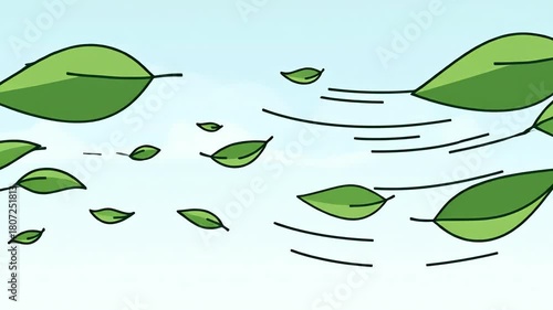 Green leaves blowing in the wind on a sunny day.