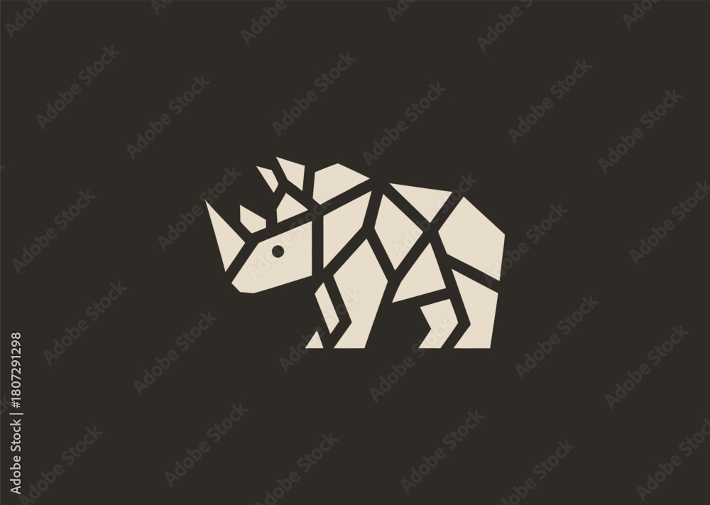 Obraz premium A strong geometric rhinoceros logo formed with sharp polygonal contours and structured line blocks, symbolizing power, protection, and resilience in a clean minimalist vector style