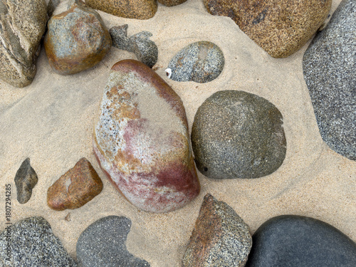 Granite Rocks on the Beach, smoothed by water and sand erosion. 