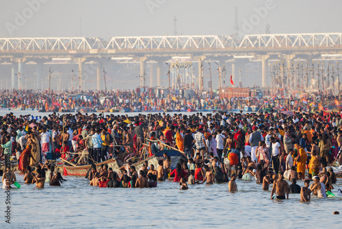 Crowds Come to the river Ganges to Bathe during the Kumbh Mela