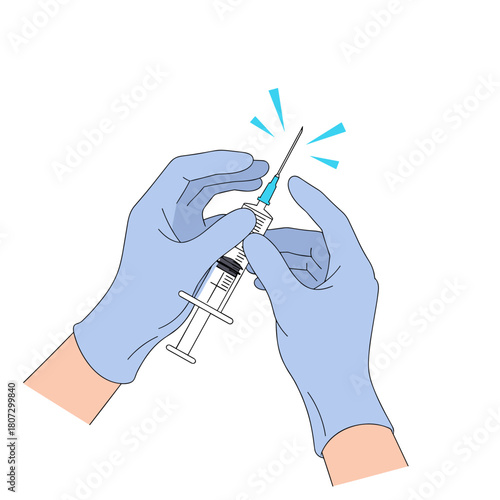 Gloved hands preparing an injection with a syringe for medicine  