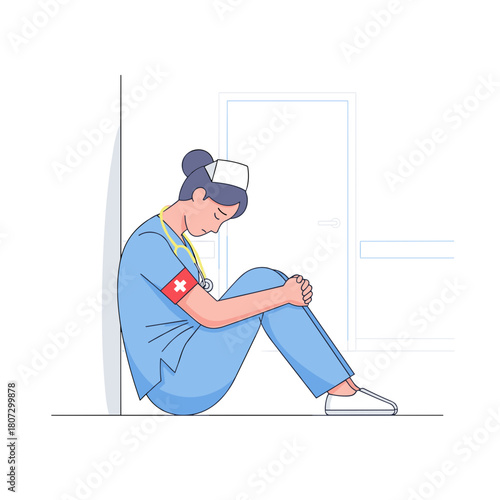 Exhausted nurse sitting on floor in hallway after long shift - Concept of medicine  
